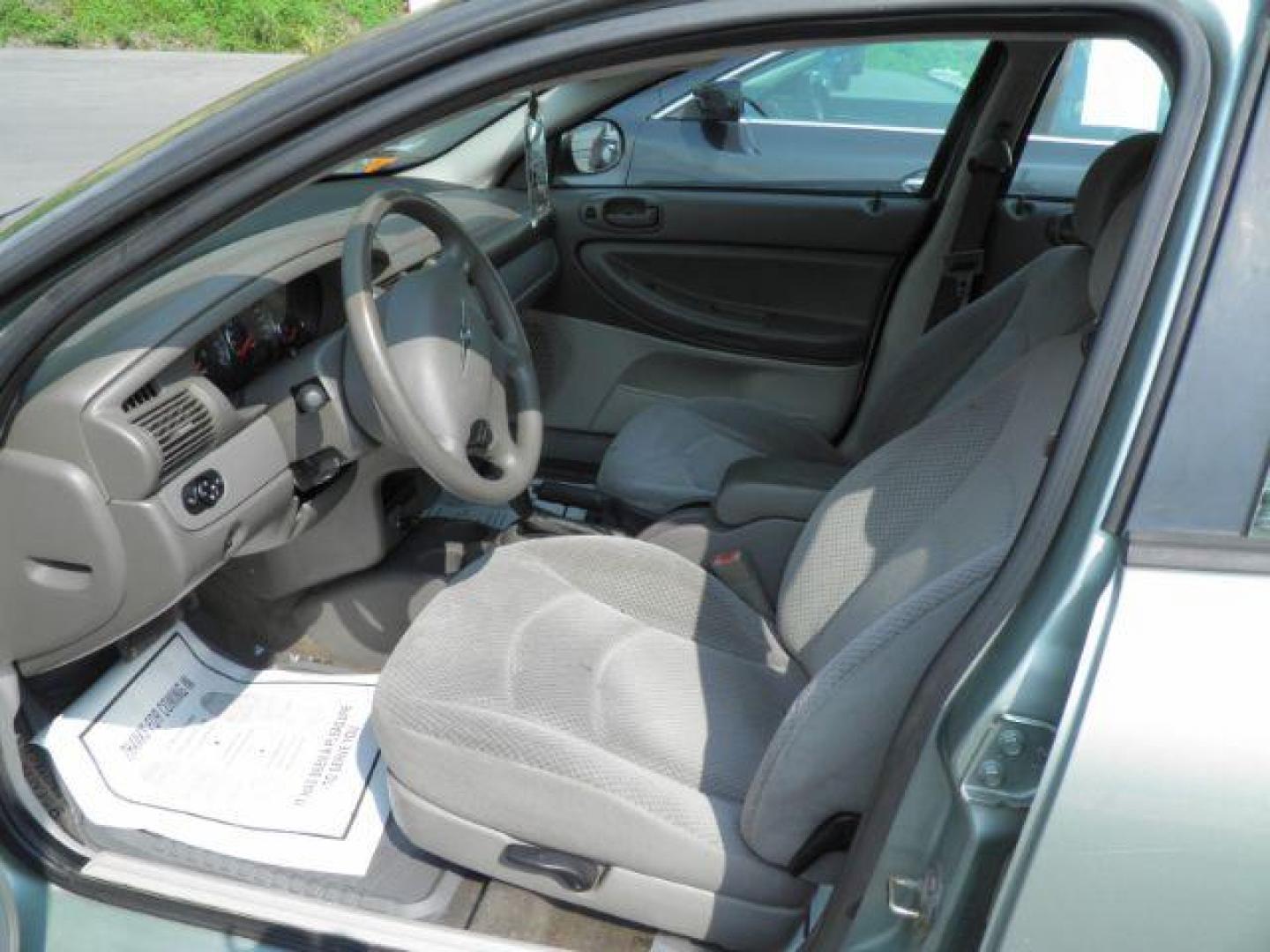 2006 GREEN Chrysler Sebring Sedan (1C3EL46X56N) with an 2.3L L4 engine, AT transmission, located at 15520 McMullen Hwy SW, Belair, MD, 21502, (301) 729-3700, 39.581375, -78.846451 - Photo#1