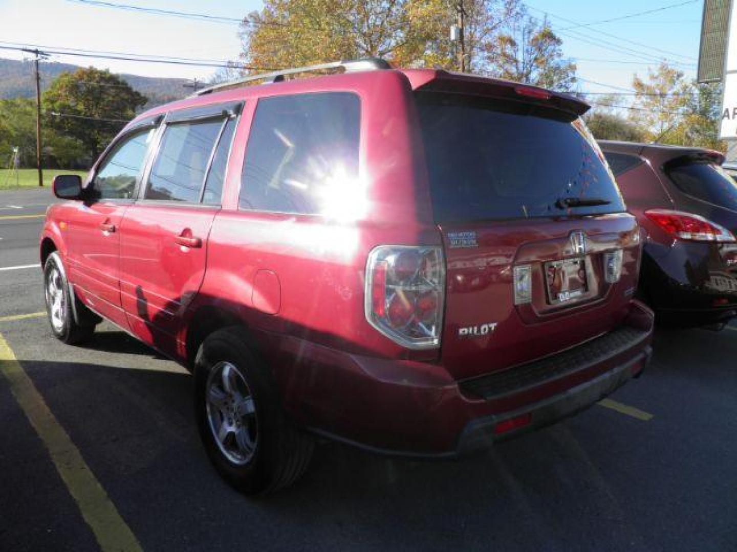 2006 RED HONDA PILOT EX 4WD (5FNYF184X6B) with an 3.5L V6 engine, AT transmission, located at 15520 McMullen Hwy SW, Belair, MD, 21502, (301) 729-3700, 39.581375, -78.846451 - Photo#6