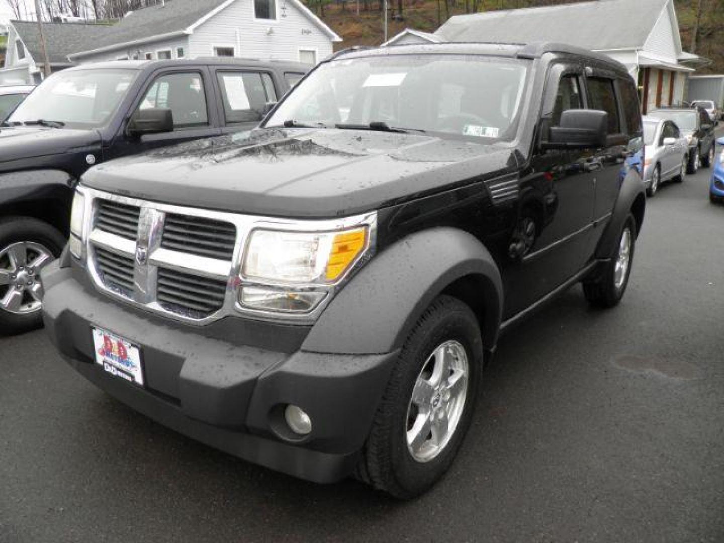 2007 Black Dodge Nitro SXT 4WD (1D8GU28K57W) with an 3.7L V6 engine, 5SP transmission, located at 15520 McMullen Hwy SW, Belair, MD, 21502, (301) 729-3700, 39.581375, -78.846451 - Photo#0