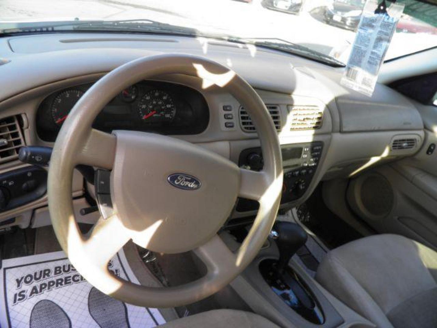 2007 TAN FORD TAURUS SE (1FAFP53U07A) with an 3.0L V6 OHV 12V engine, AT transmission, located at 15520 McMullen Hwy SW, Belair, MD, 21502, (301) 729-3700, 39.581375, -78.846451 - Photo#2