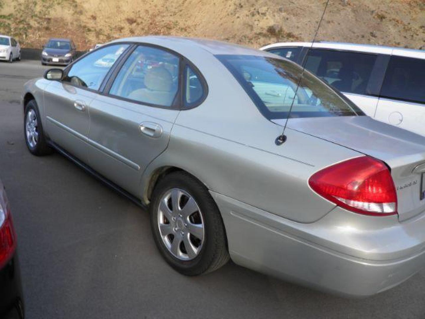 2007 TAN FORD TAURUS SE (1FAFP53U07A) with an 3.0L V6 OHV 12V engine, AT transmission, located at 15520 McMullen Hwy SW, Belair, MD, 21502, (301) 729-3700, 39.581375, -78.846451 - Photo#4