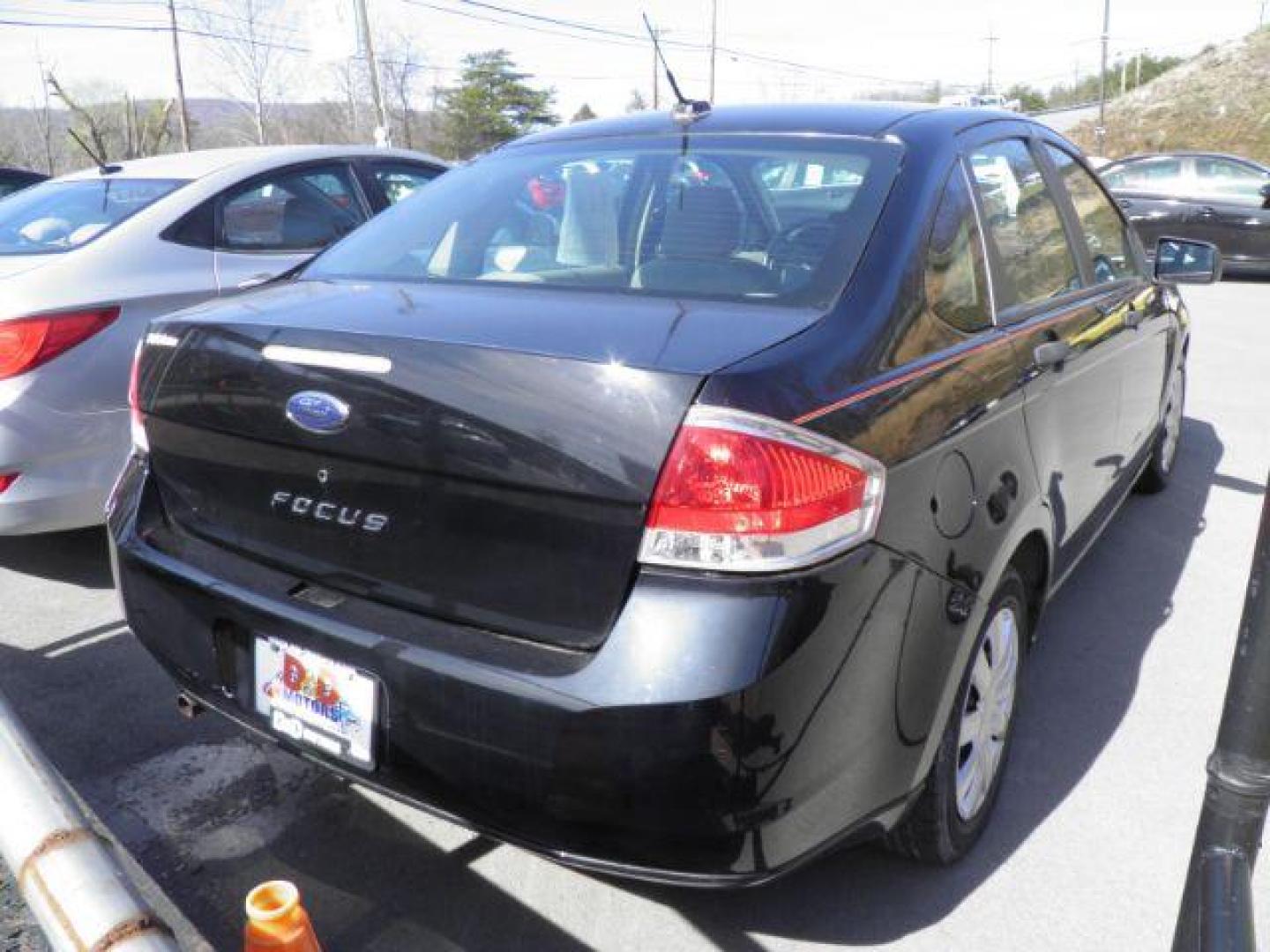 2008 BLACK Ford Focus S Sedan (1FAHP34N78W) with an 2.0L L4 engine, 4-Speed Automatic transmission, located at 15520 McMullen Hwy SW, Belair, MD, 21502, (301) 729-3700, 39.581375, -78.846451 - Photo#4