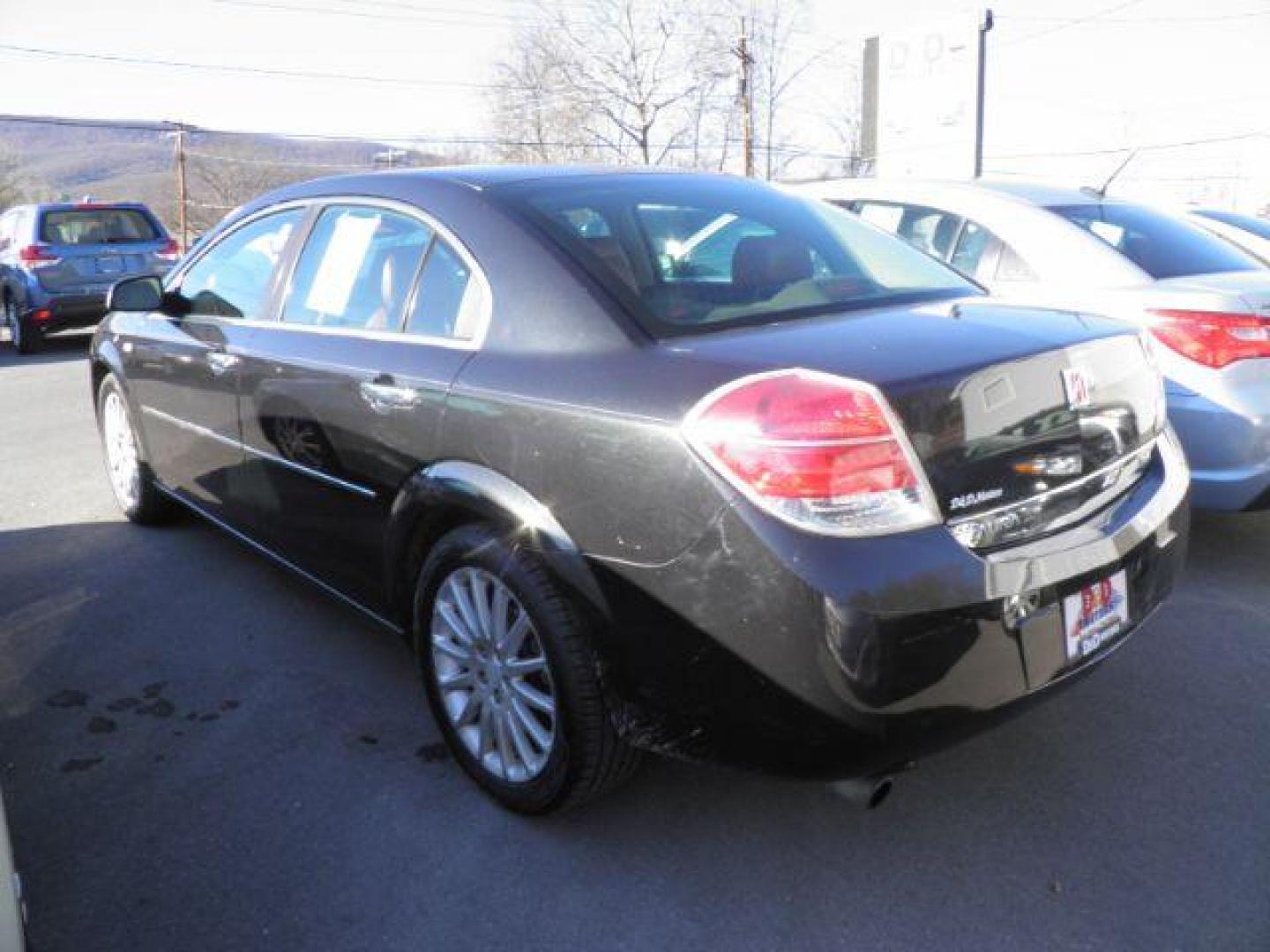 2008 BLACK Saturn Aura XR (1G8ZV57718F) with an 3.6L V6 engine, AT transmission, located at 15520 McMullen Hwy SW, Belair, MD, 21502, (301) 729-3700, 39.581375, -78.846451 - Photo#4