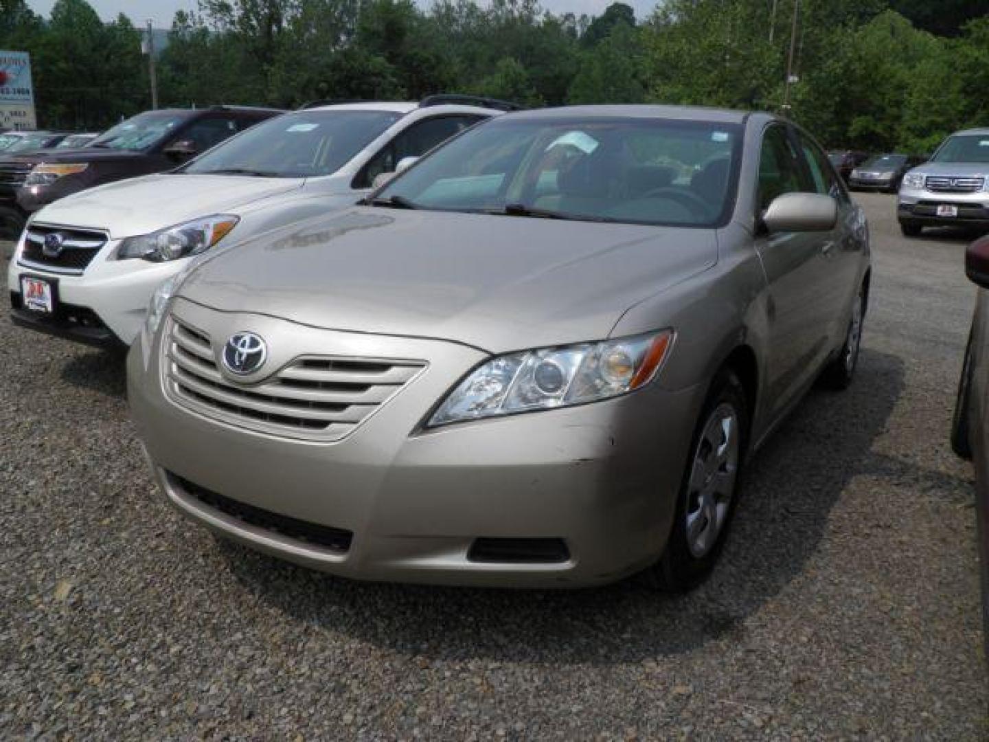 2008 GOLD Toyota Camry LE (4T1BE46K48U) with an 2.4L L4 engine, AT transmission, located at 15520 McMullen Hwy SW, Belair, MD, 21502, (301) 729-3700, 39.581375, -78.846451 - Photo#0