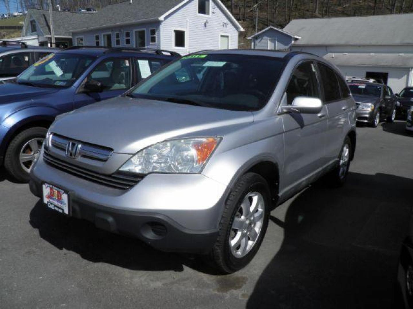 2009 SILVER Honda CR-V EX-L 4WD 5-Speed AT (5J6RE48779L) with an 2.4L L4 engine, AT transmission, located at 15520 McMullen Hwy SW, Belair, MD, 21502, (301) 729-3700, 39.581375, -78.846451 - Photo#0