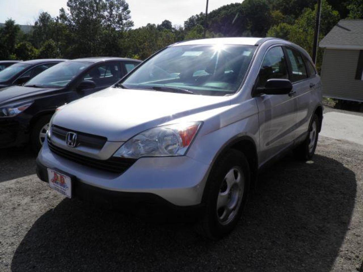 2009 SILVER Honda CR-V LX 4WD 5-Speed AT (5J6RE48329L) with an 2.4L L4 engine, AT transmission, located at 19521 New George's Creek Rd SW, Barton, MD, 21521, (301) 463-2404, 39.524323, -79.017906 - Photo#0