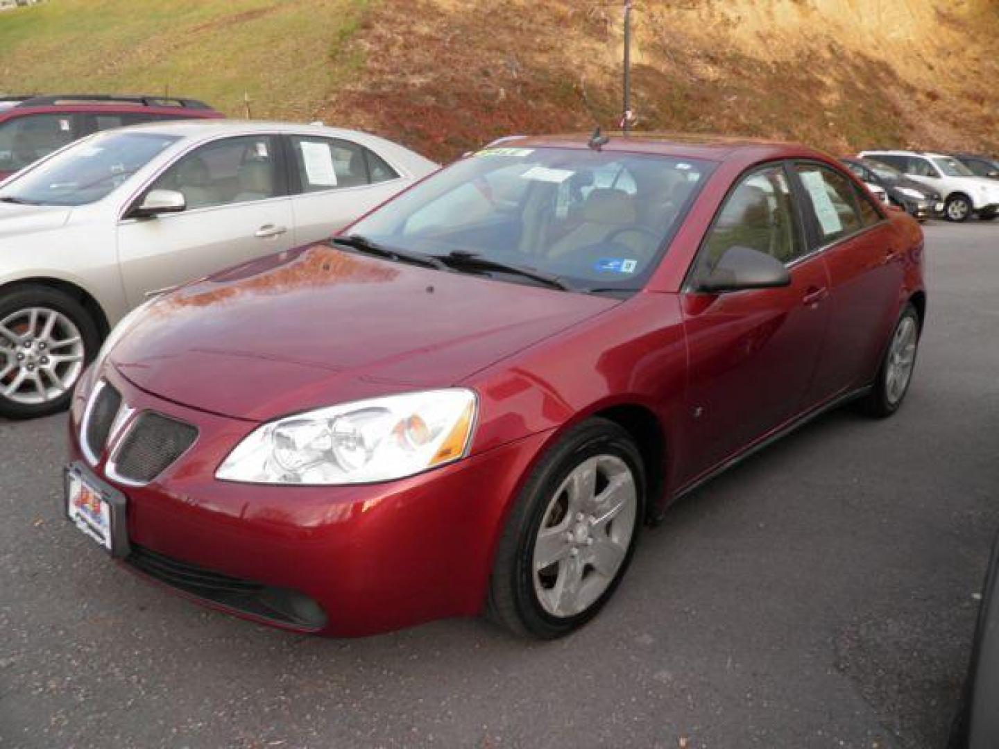 2009 RED PONTIAC G6 Sedan (1G2ZG57B394) with an 2.4L L4 DOHC 16V engine, 4-Speed Automatic transmission, located at 15520 McMullen Hwy SW, Belair, MD, 21502, (301) 729-3700, 39.581375, -78.846451 - Photo#0