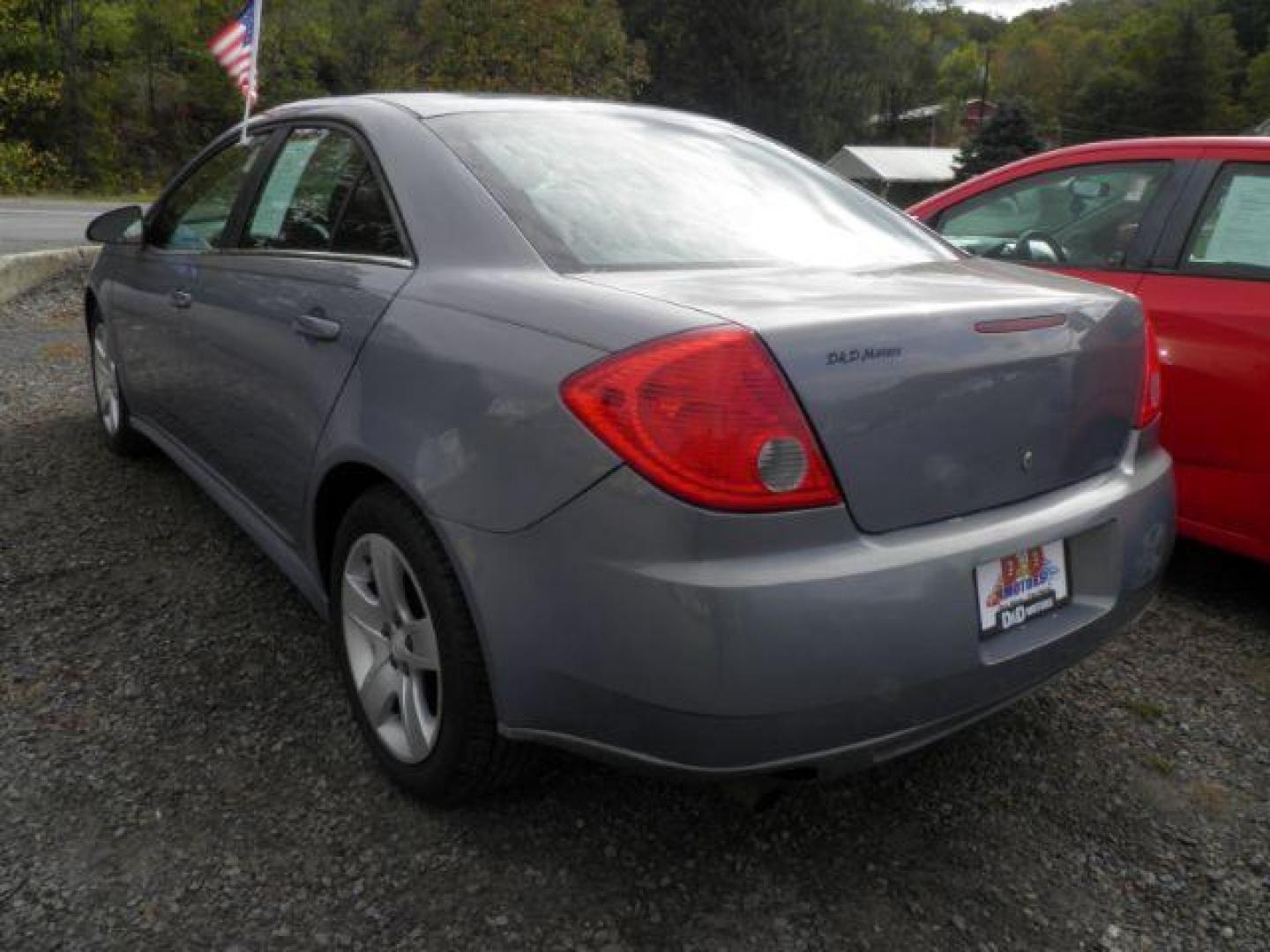 2009 BLUE Pontiac G6 Sedan (1G2ZJ57B594) with an 2.4l L4 engine, AT transmission, located at 19521 New George's Creek Rd SW, Barton, MD, 21521, (301) 463-2404, 39.524323, -79.017906 - Photo#4