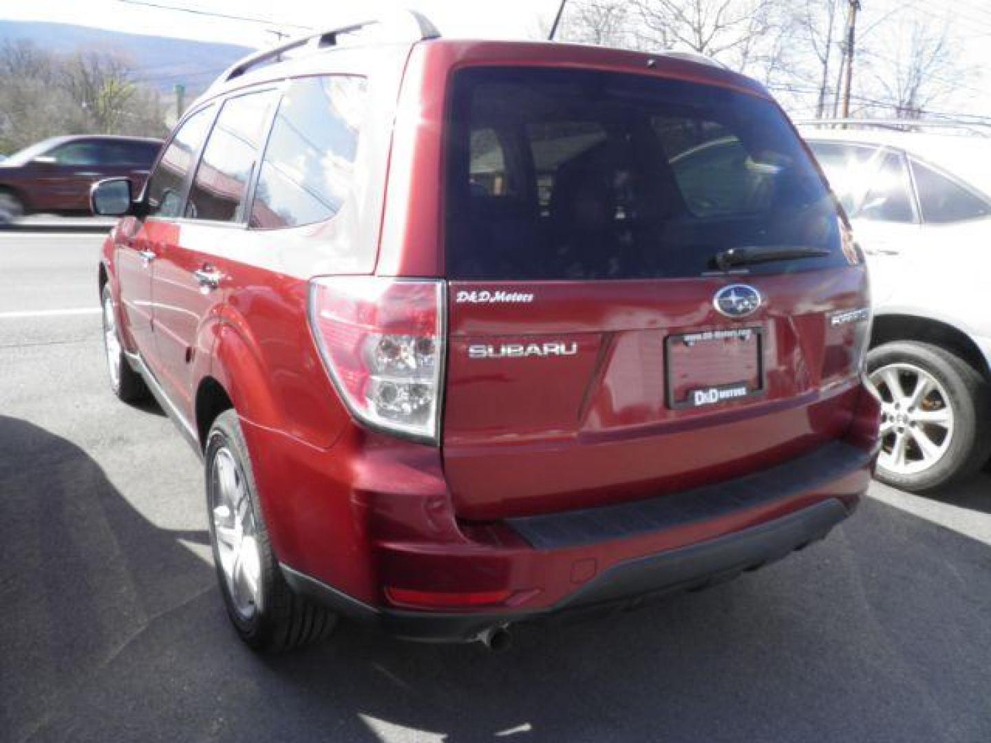 2009 RED Subaru Forester 2.5X Limited (JF2SH64619H) with an 2.5 L4 engine, AT transmission, located at 15520 McMullen Hwy SW, Belair, MD, 21502, (301) 729-3700, 39.581375, -78.846451 - Photo#5