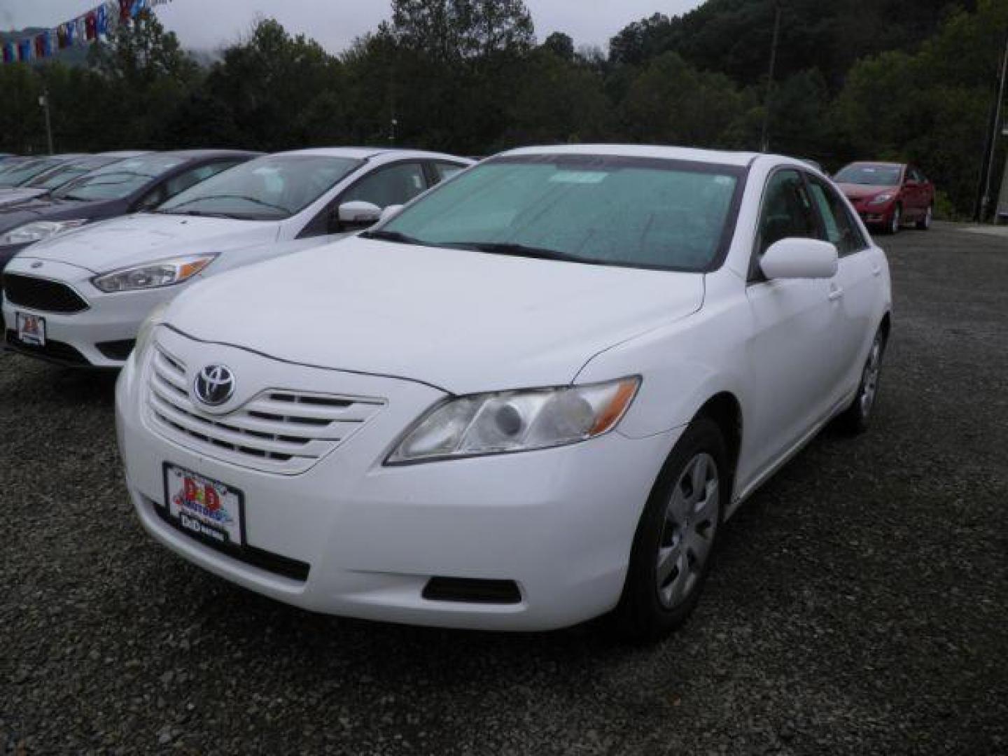 2009 White Toyota Camry LE 5-Spd AT (4T1BE46K19U) with an 2.4L L4 engine, AT transmission, located at 19521 New George's Creek Rd SW, Barton, MD, 21521, (301) 463-2404, 39.524323, -79.017906 - Photo#0