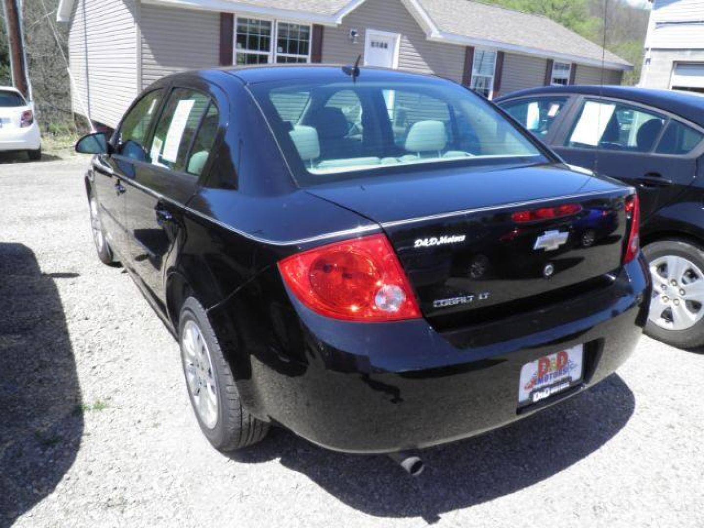 2010 Black Chevrolet Cobalt LT1 Sedan (1G1AD5F57A7) with an 2.2L L4 engine, AT transmission, located at 19521 New George's Creek Rd SW, Barton, MD, 21521, (301) 463-2404, 39.524323, -79.017906 - Photo#4