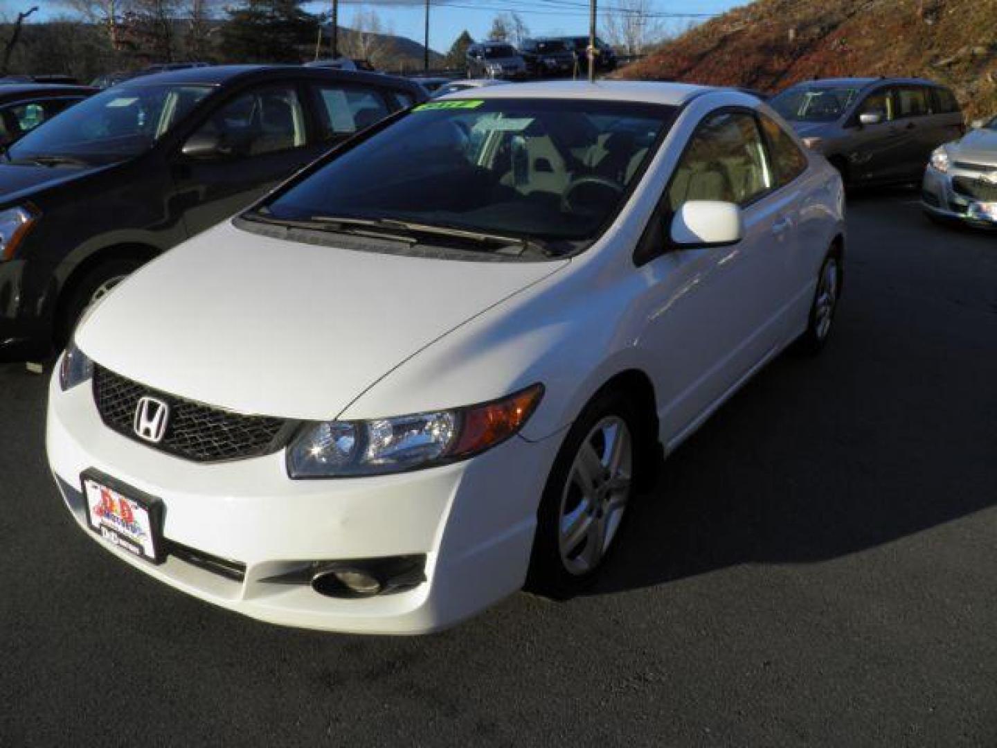 2010 WHITE Honda Civic LX Coupe 5-Speed AT (2HGFG1B67AH) with an 1.8L L4 engine, AT transmission, located at 19521 New George's Creek Rd SW, Barton, MD, 21521, (301) 463-2404, 39.524323, -79.017906 - Photo#0