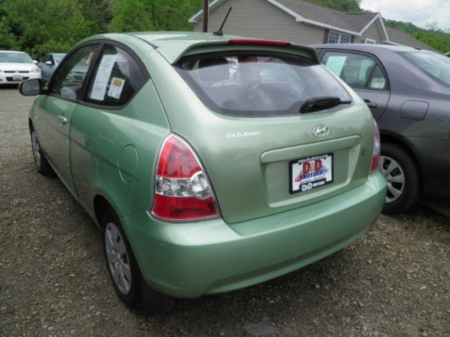 2010 Green Hyundai Accent GS 3-Door (KMHCM3AC6AU) with an 1.6l L4 engine, AT transmission, located at 19521 New George's Creek Rd SW, Barton, MD, 21521, (301) 463-2404, 39.524323, -79.017906 - Photo#4