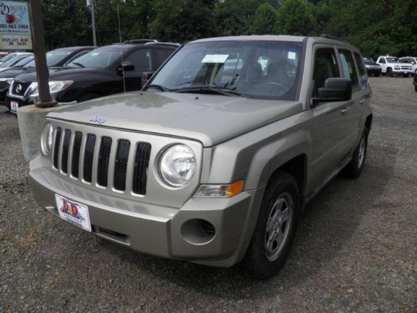 2010 TAN Jeep Patriot Sport 2WD (1J4NT2GB4AD) with an 2.4L L4 engine, AT transmission, located at 19521 New George's Creek Rd SW, Barton, MD, 21521, (301) 463-2404, 39.524323, -79.017906 - Photo#0