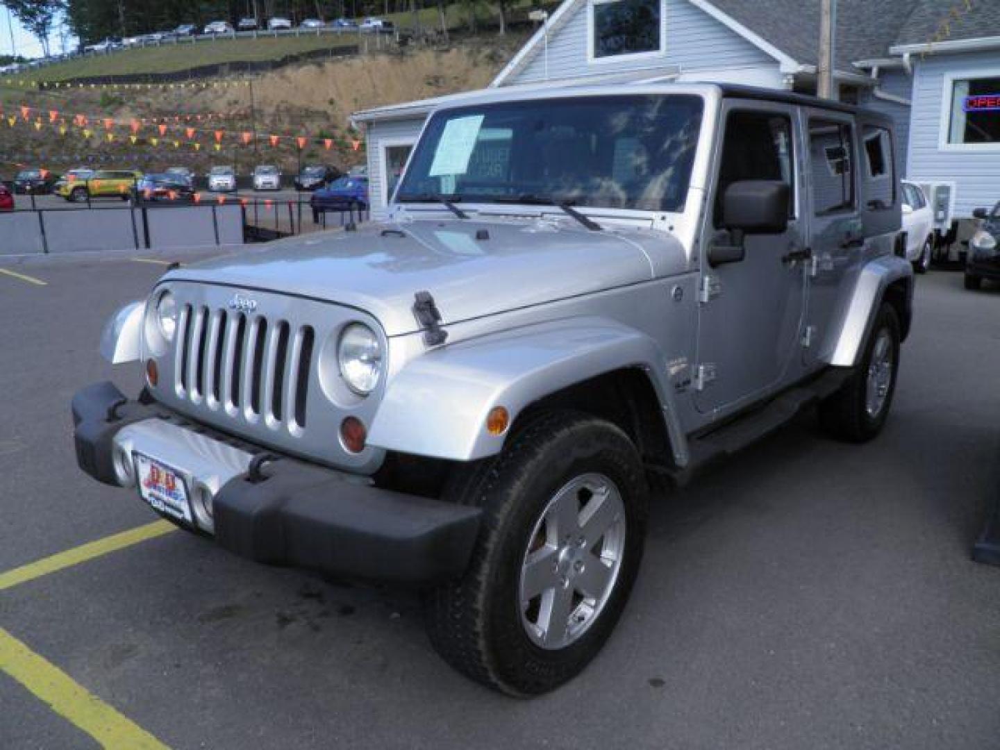 2010 SILVER Jeep Wrangler Unlimited Sahara 4WD (1J4HA5H15AL) with an 3.8 V6 engine, AT transmission, located at 15520 McMullen Hwy SW, Belair, MD, 21502, (301) 729-3700, 39.581375, -78.846451 - Photo#0