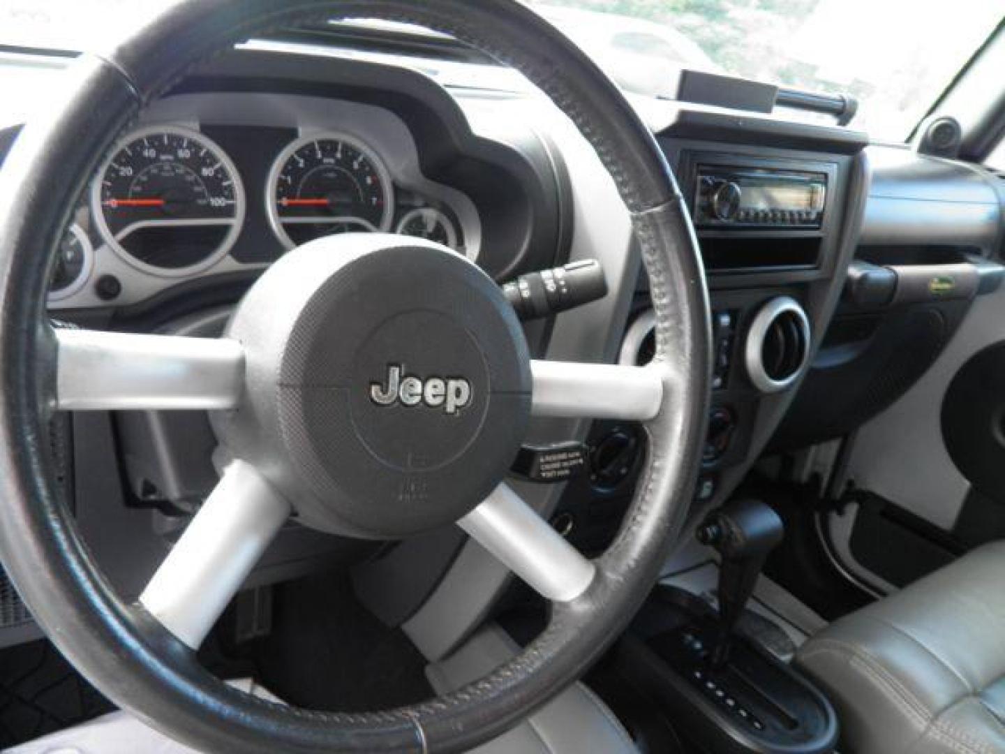 2010 SILVER Jeep Wrangler Unlimited Sahara 4WD (1J4HA5H15AL) with an 3.8 V6 engine, AT transmission, located at 15520 McMullen Hwy SW, Belair, MD, 21502, (301) 729-3700, 39.581375, -78.846451 - Photo#2