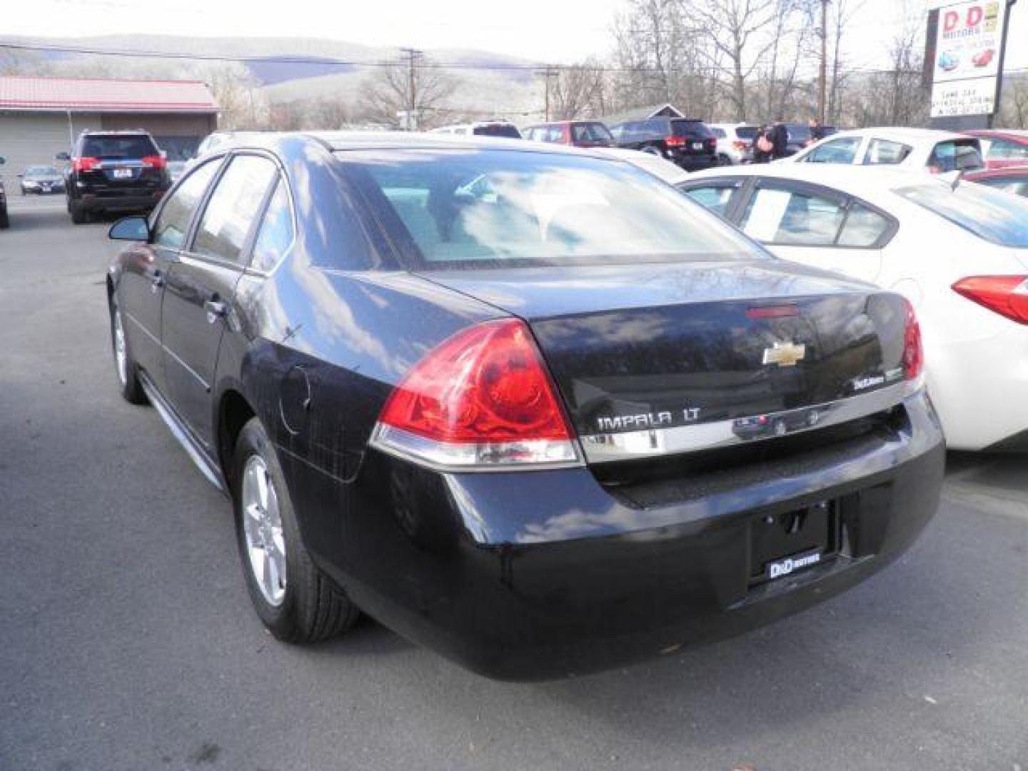 2011 Black Chevrolet Impala LT (2G1WG5EK9B1) with an 3.5L V6 engine, AT transmission, located at 15520 McMullen Hwy SW, Belair, MD, 21502, (301) 729-3700, 39.581375, -78.846451 - Photo#4