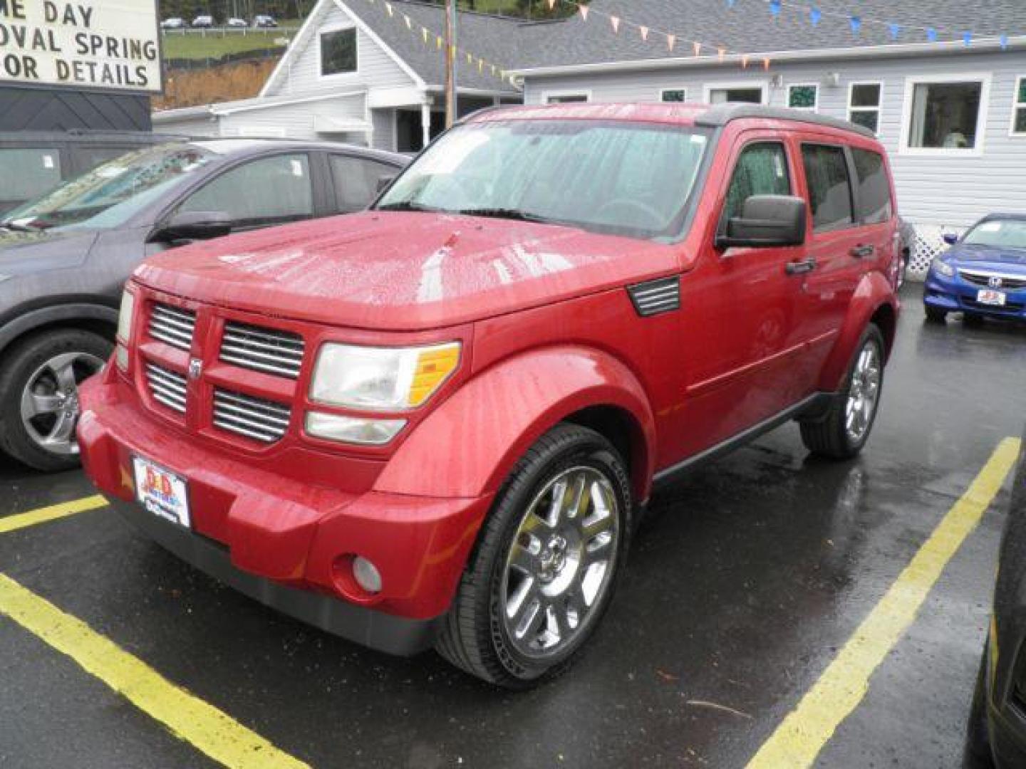 2011 RED Dodge Nitro Heat 4WD (1D4PU4GK9BW) with an 3.7L V6 engine, AT transmission, located at 19521 New George's Creek Rd SW, Barton, MD, 21521, (301) 463-2404, 39.524323, -79.017906 - Photo#0