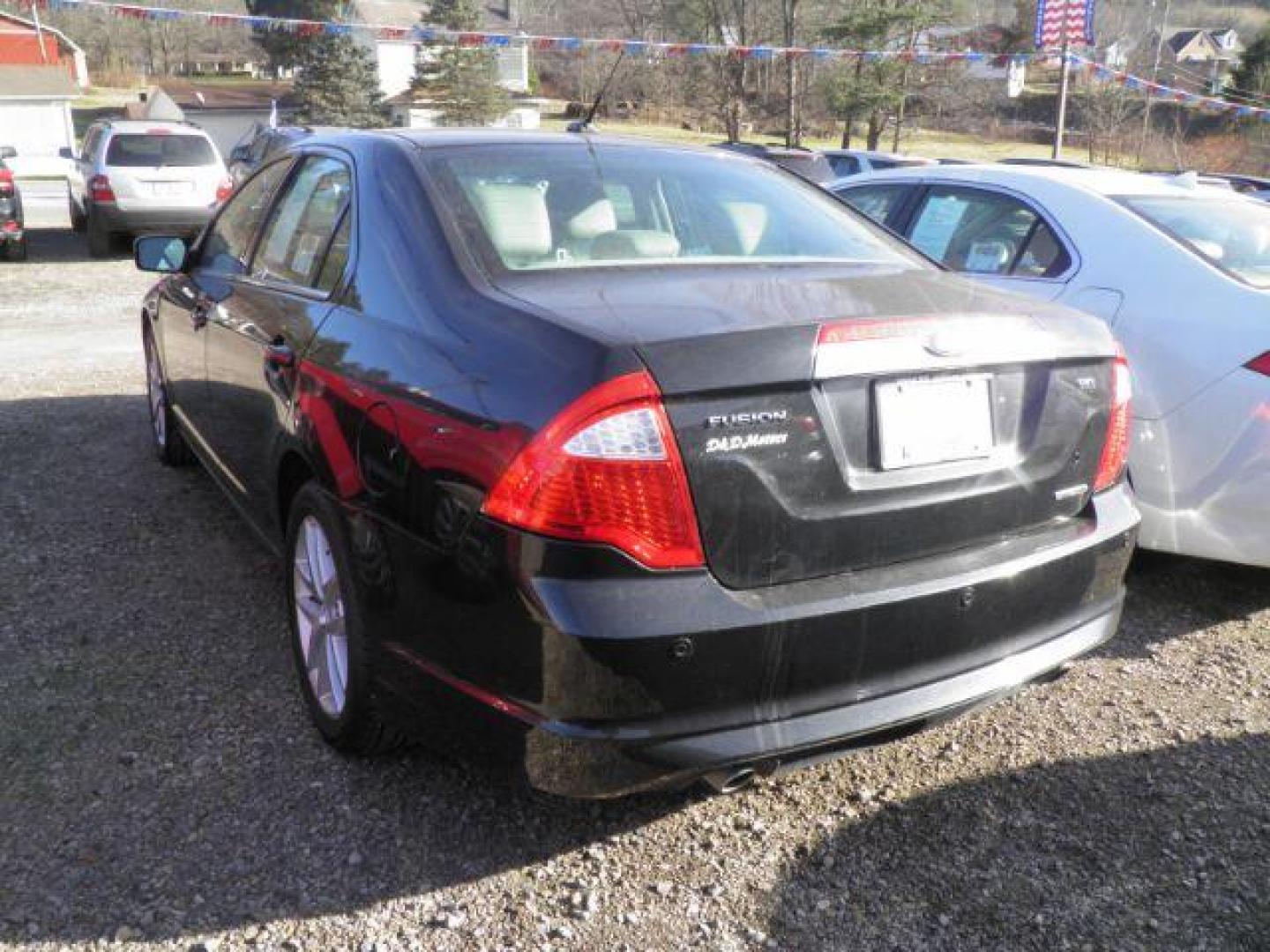 2011 BLACK Ford Fusion V6 SEL (3FAHP0JG2BR) with an 3.0l V6 engine, AT transmission, located at 19521 New George's Creek Rd SW, Barton, MD, 21521, (301) 463-2404, 39.524323, -79.017906 - Photo#4