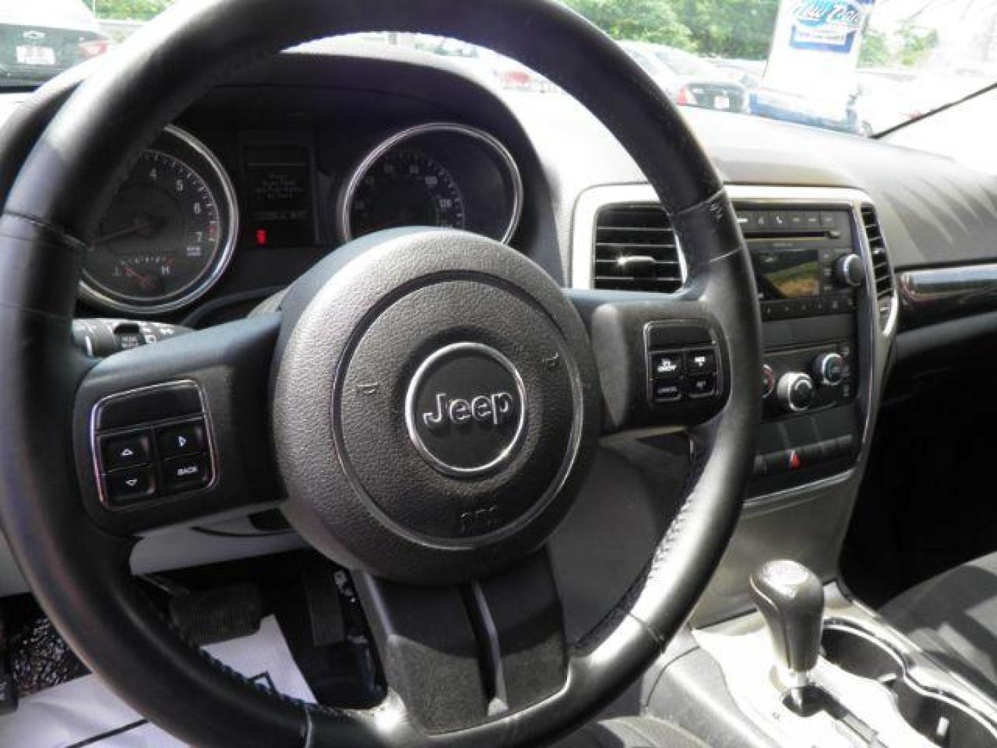 2011 BLACK Jeep Grand Cherokee Laredo 4WD (1J4RR4GG8BC) with an 3.6L V6 engine, AT transmission, located at 15520 McMullen Hwy SW, Belair, MD, 21502, (301) 729-3700, 39.581375, -78.846451 - Photo#2