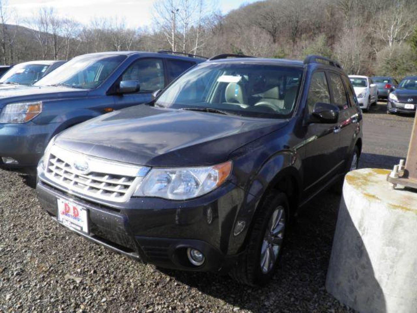 2011 GRAY Subaru Forester 2.5X Limited (JF2SHBFC7BH) with an 2.5 L4 engine, AT transmission, located at 19521 New George's Creek Rd SW, Barton, MD, 21521, (301) 463-2404, 39.524323, -79.017906 - Photo#0