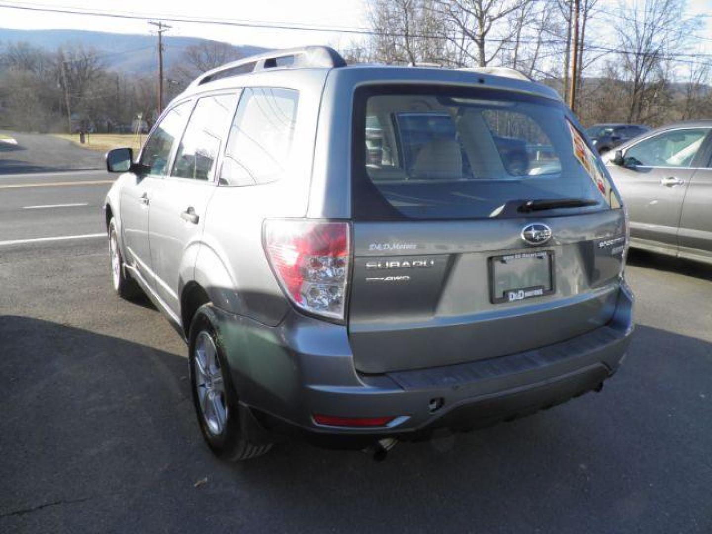 2011 BLUE Subaru Forester 2.5X Touring (JF2SHABC0BH) with an 2.5 L4 engine, AT transmission, located at 15520 McMullen Hwy SW, Belair, MD, 21502, (301) 729-3700, 39.581375, -78.846451 - Photo#4