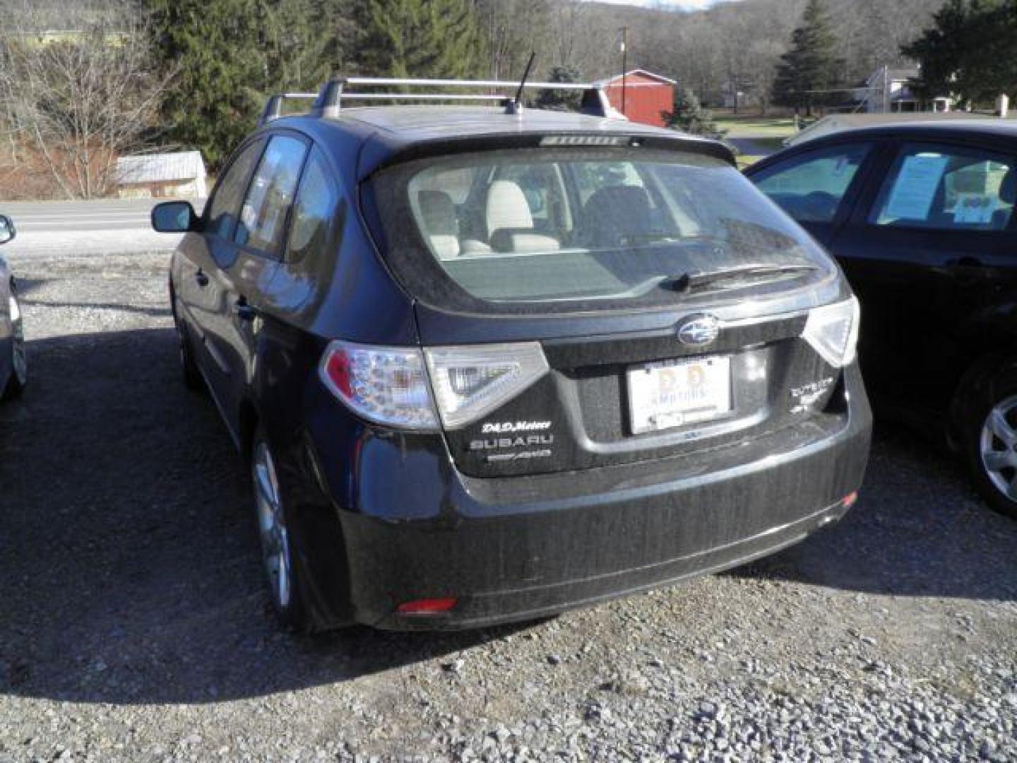 2011 BLACK Subaru Impreza Outback Sport (JF1GH6D66BH) with an 2.5 L4 engine, AT transmission, located at 19521 New George's Creek Rd SW, Barton, MD, 21521, (301) 463-2404, 39.524323, -79.017906 - Photo#5