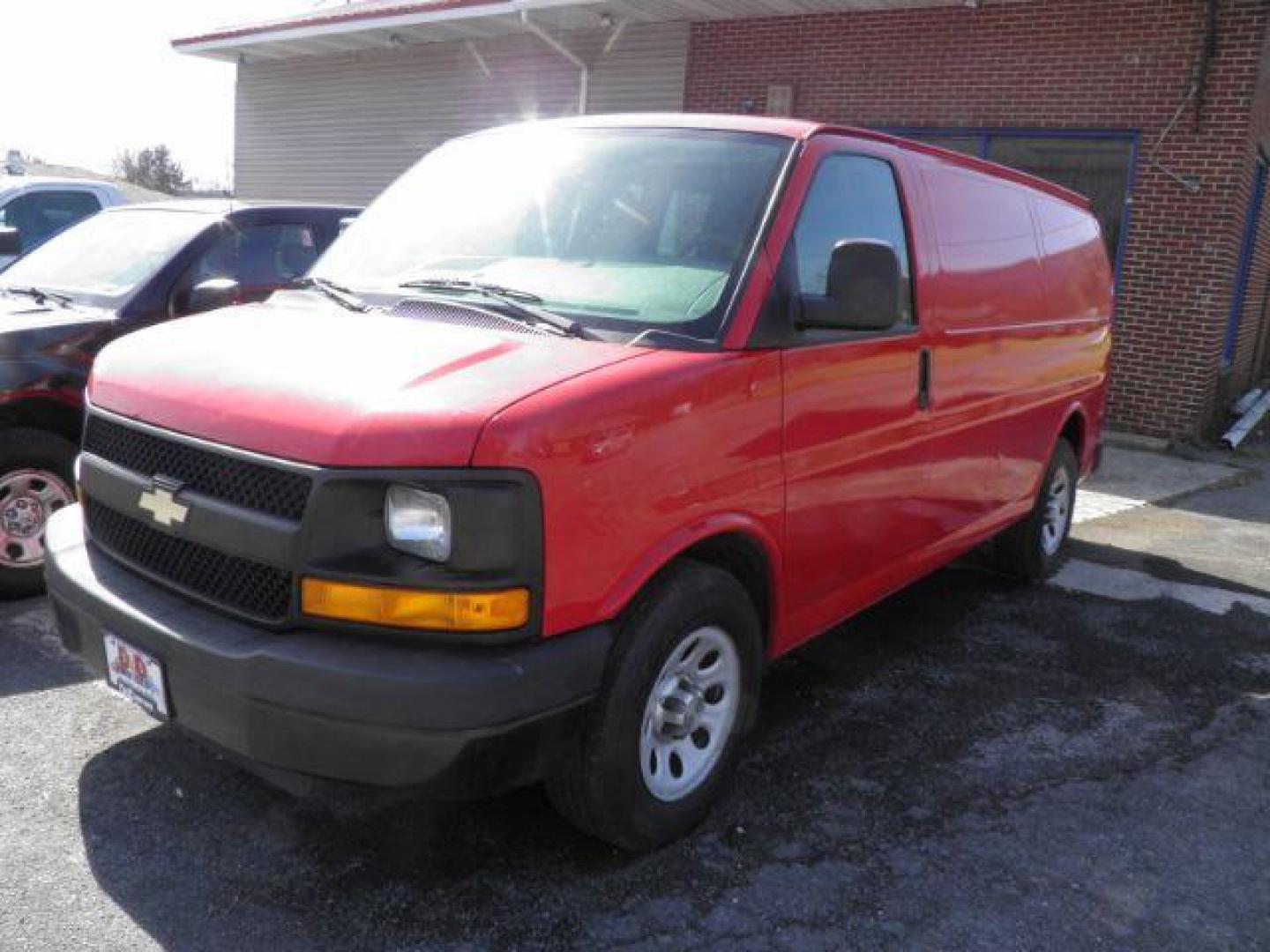 2012 RED Chevrolet Express 1500 Cargo (1GCSGAFX1C1) with an 4.3L V6 engine, AT transmission, located at 19521 New George's Creek Rd SW, Barton, MD, 21521, (301) 463-2404, 39.524323, -79.017906 - Photo#0