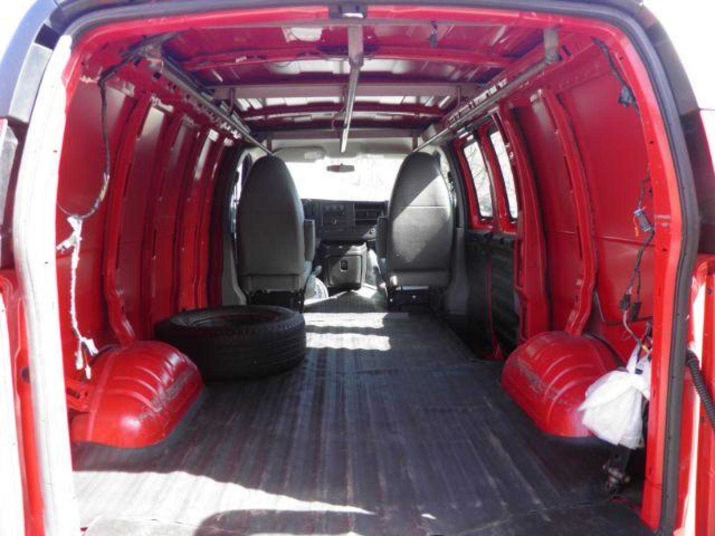 2012 RED Chevrolet Express 1500 Cargo (1GCSGAFX1C1) with an 4.3L V6 engine, AT transmission, located at 19521 New George's Creek Rd SW, Barton, MD, 21521, (301) 463-2404, 39.524323, -79.017906 - Photo#3