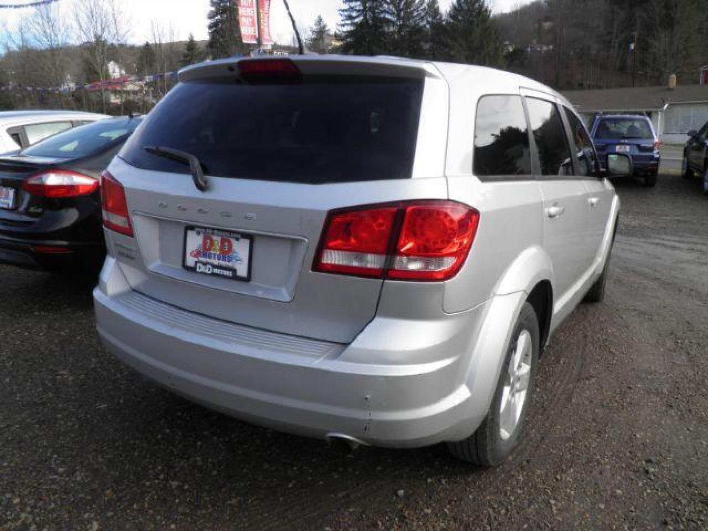 2012 SILVER DODGE JOURNEY SE (3C4PDCAB8CT) with an 2.4L L4 DOHC 16V engine, 4-Speed Automatic transmission, located at 19521 New George's Creek Rd SW, Barton, MD, 21521, (301) 463-2404, 39.524323, -79.017906 - Photo#6