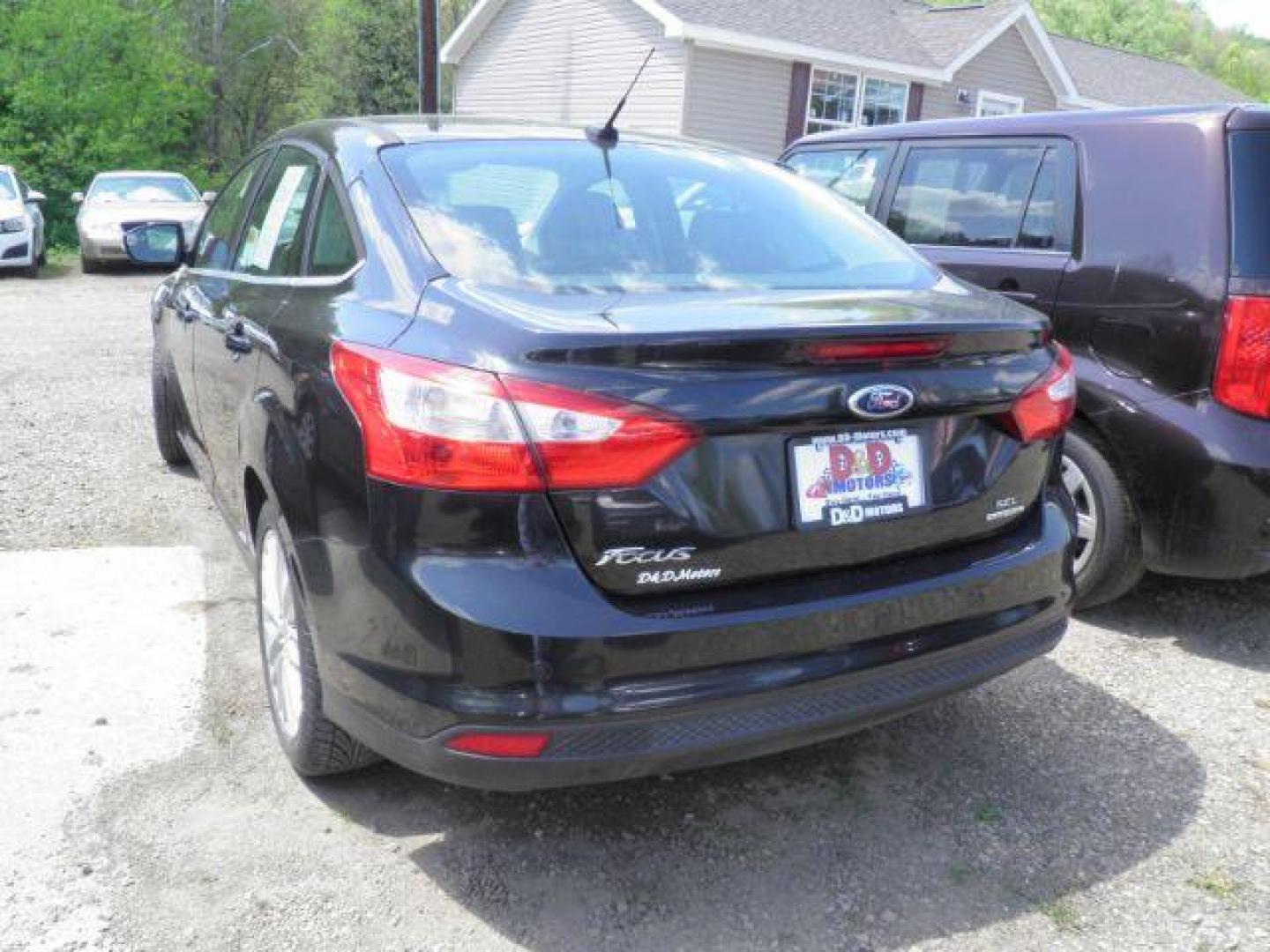 2012 BLACK Ford Focus SEL Sedan (1FAHP3H2XCL) with an 2.0L L4 engine, AT transmission, located at 19521 New George's Creek Rd SW, Barton, MD, 21521, (301) 463-2404, 39.524323, -79.017906 - Photo#4