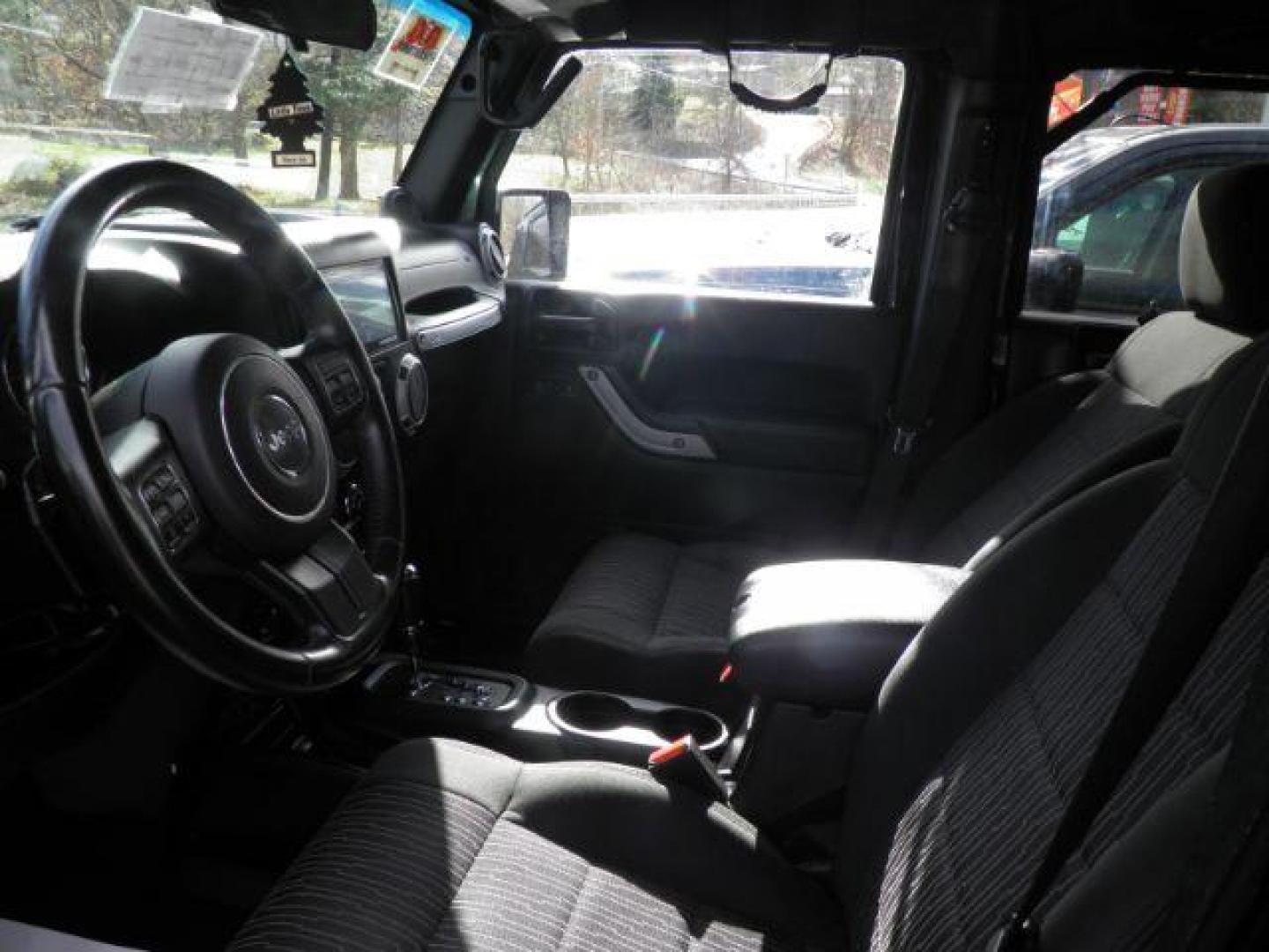 2012 Black Jeep Wrangler Unlimited Sport 4WD (1C4HJWDG5CL) with an 3.6L V6 engine, located at 19521 New George's Creek Rd SW, Barton, MD, 21521, (301) 463-2404, 39.524323, -79.017906 - Photo#1