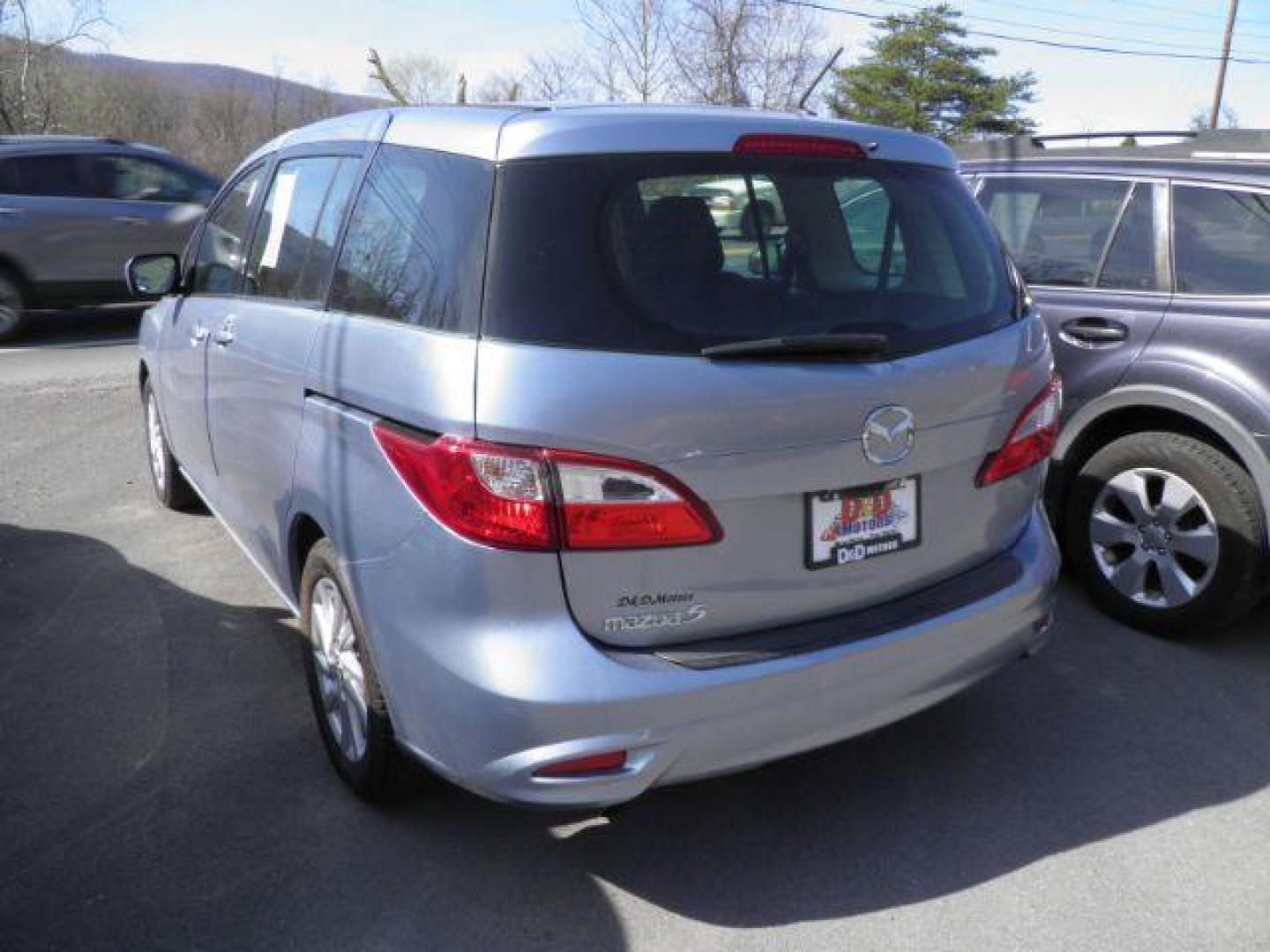 2012 BLUE Mazda MAZDA5 Sport (JM1CW2BL4C0) with an 2.5 L4 engine, AT transmission, located at 15520 McMullen Hwy SW, Belair, MD, 21502, (301) 729-3700, 39.581375, -78.846451 - Photo#4