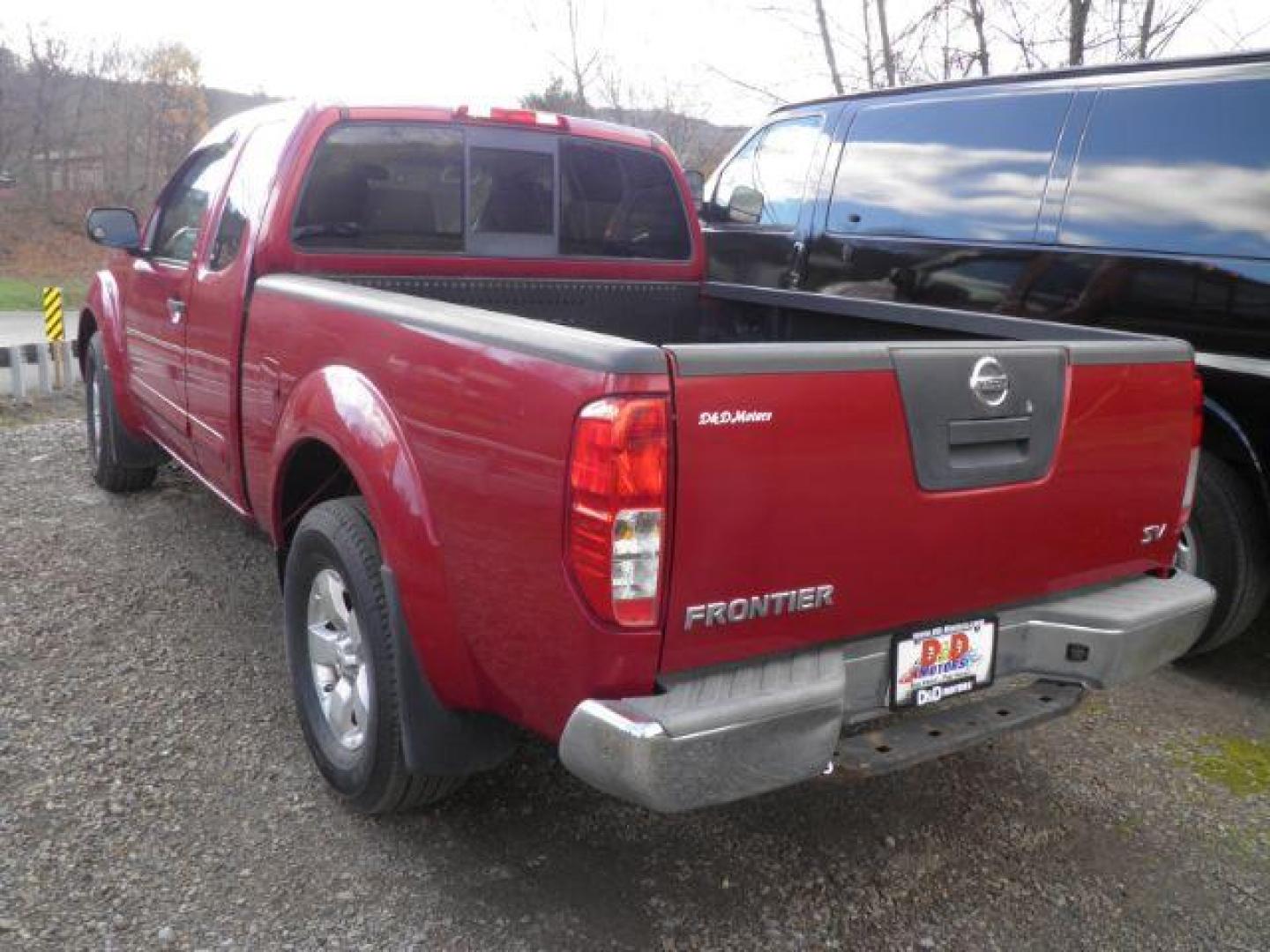 2012 RED Nissan Frontier SV I4 King Cab 2WD (1N6BD0CT6CC) with an 2.5 L4 engine, located at 19521 New George's Creek Rd SW, Barton, MD, 21521, (301) 463-2404, 39.524323, -79.017906 - Photo#4