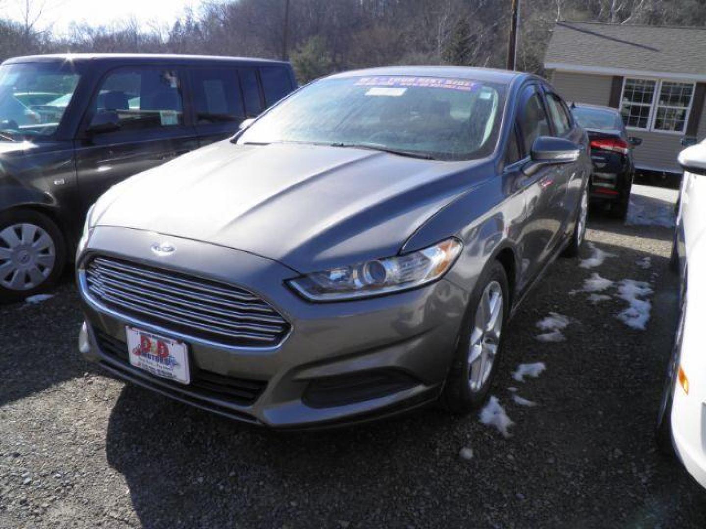 2013 GRAY Ford Fusion SE (3FA6P0H79DR) with an 2.5 L4 engine, AT transmission, located at 19521 New George's Creek Rd SW, Barton, MD, 21521, (301) 463-2404, 39.524323, -79.017906 - Photo#0