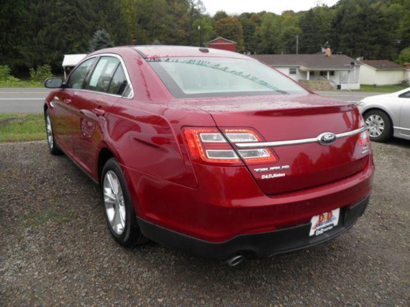 2013 RED Ford Taurus SEL FWD (1FAHP2E82DG) with an 3.5L V6 engine, AT transmission, located at 19521 New George's Creek Rd SW, Barton, MD, 21521, (301) 463-2404, 39.524323, -79.017906 - Photo#4