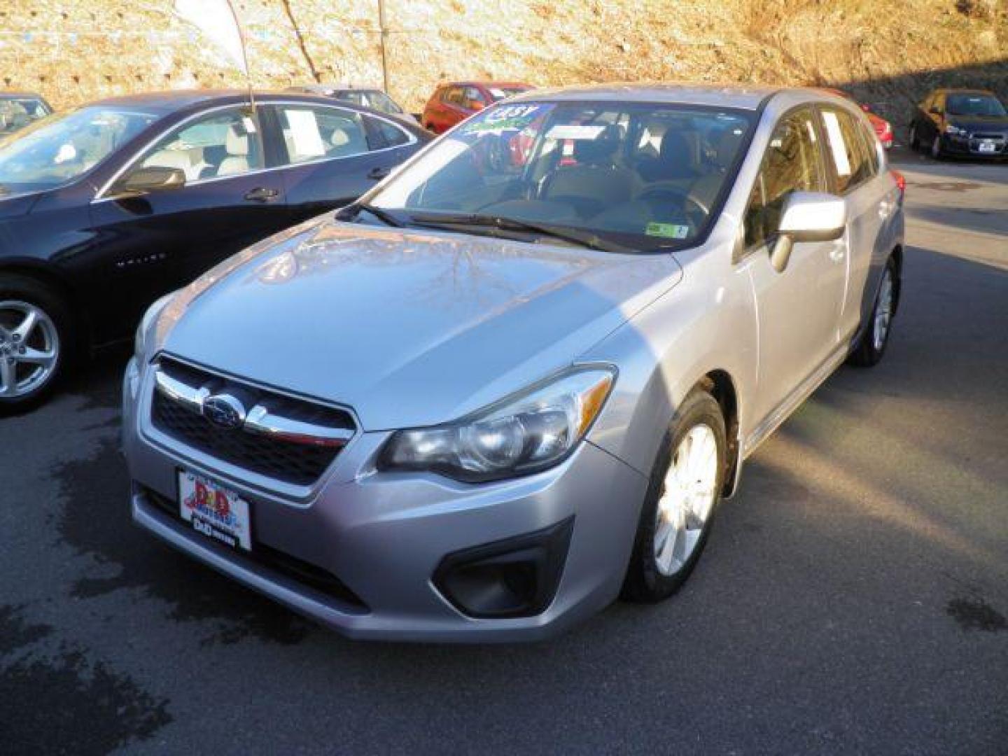 2013 SILVER SUBARU IMPREZA 2.0i Premium 5-Door (JF1GPAC63DH) with an 2.0L L4 engine, AT transmission, located at 15520 McMullen Hwy SW, Belair, MD, 21502, (301) 729-3700, 39.581375, -78.846451 - Photo#0