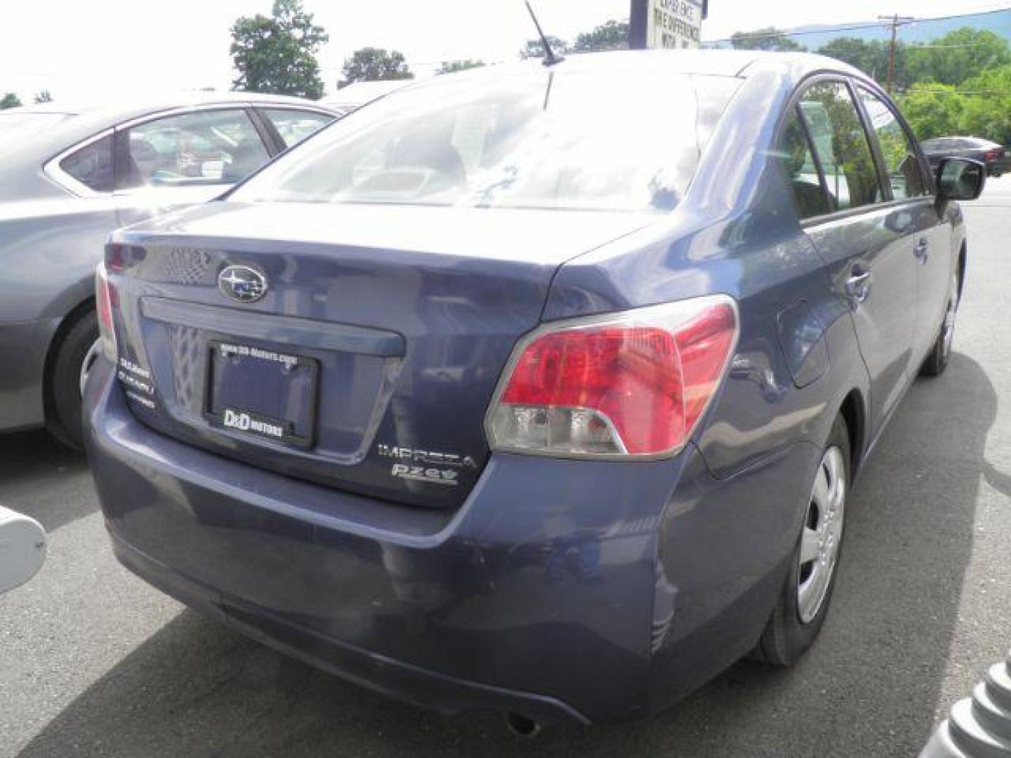 2013 BLUE Subaru Impreza Base 4-Door (JF1GJAA6XDH) with an 2.0L L4 engine, CVT transmission, located at 15520 McMullen Hwy SW, Belair, MD, 21502, (301) 729-3700, 39.581375, -78.846451 - Photo#4