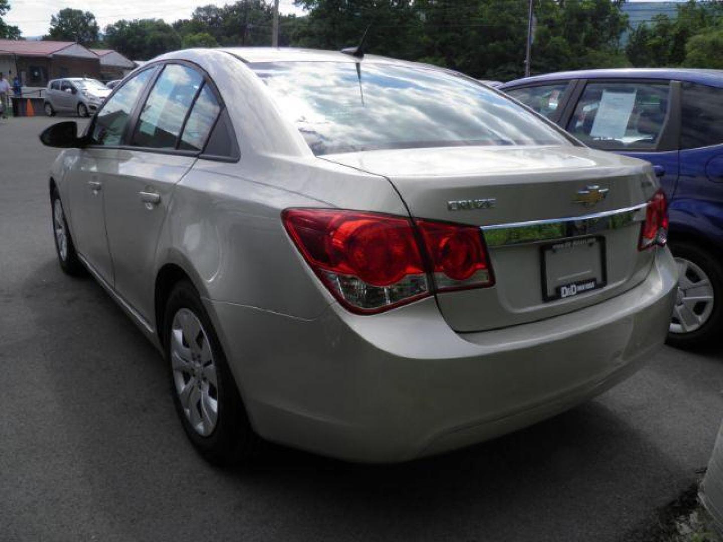 2014 GOLD Chevrolet Cruze LS Auto (1G1PA5SHXE7) with an 1.8l L4 engine, AT transmission, located at 15520 McMullen Hwy SW, Belair, MD, 21502, (301) 729-3700, 39.581375, -78.846451 - Photo#4