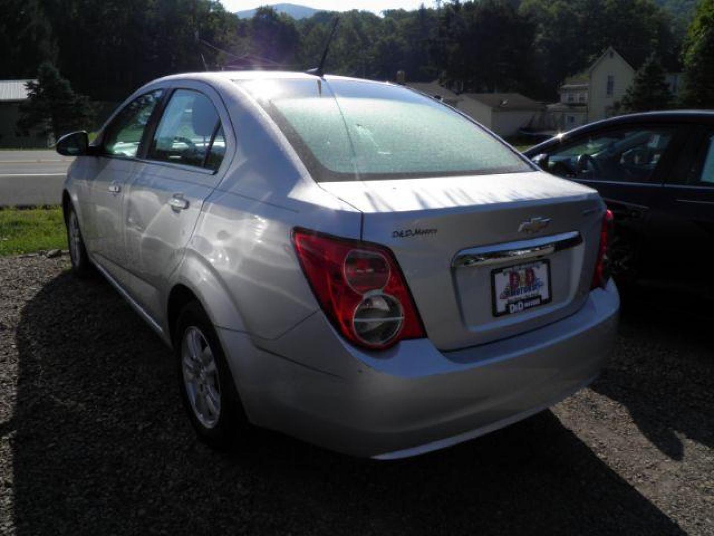 2014 SILVER Chevrolet Sonic LT Auto Sedan (1G1JC5SH3E4) with an 1.8L L4 engine, AT transmission, located at 19521 New George's Creek Rd SW, Barton, MD, 21521, (301) 463-2404, 39.524323, -79.017906 - Photo#4