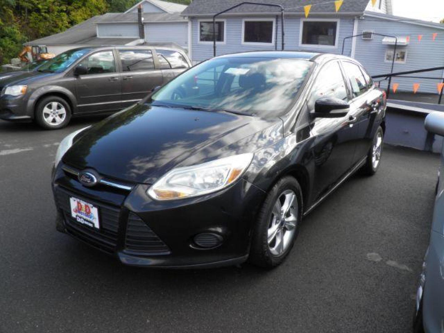 2014 BLACK FORD FOCUS SE Sedan (1FADP3F24EL) with an 2.0L L4 engine, AT transmission, located at 15520 McMullen Hwy SW, Belair, MD, 21502, (301) 729-3700, 39.581375, -78.846451 - Photo#0