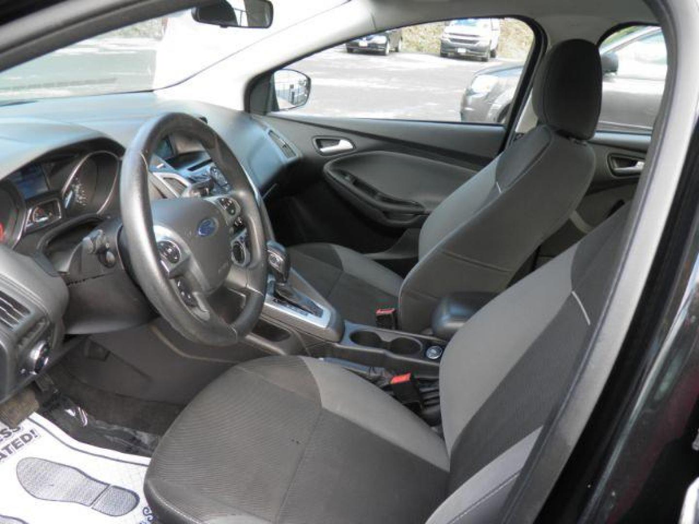 2014 BLACK FORD FOCUS SE Sedan (1FADP3F24EL) with an 2.0L L4 engine, AT transmission, located at 15520 McMullen Hwy SW, Belair, MD, 21502, (301) 729-3700, 39.581375, -78.846451 - Photo#1