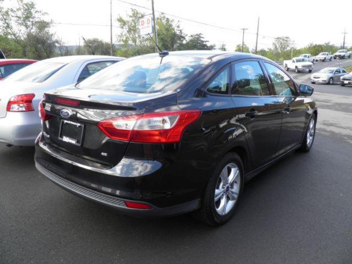 2014 BLACK FORD FOCUS SE Sedan (1FADP3F24EL) with an 2.0L L4 engine, AT transmission, located at 15520 McMullen Hwy SW, Belair, MD, 21502, (301) 729-3700, 39.581375, -78.846451 - Photo#4