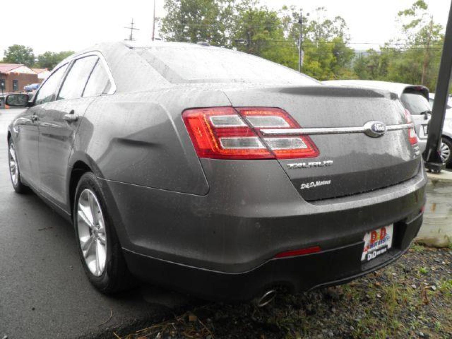 2014 GRAY FORD TAURUS SEL AWD (1FAHP2H82EG) with an 3.5L V6 engine, AT transmission, located at 15520 McMullen Hwy SW, Belair, MD, 21502, (301) 729-3700, 39.581375, -78.846451 - Photo#4