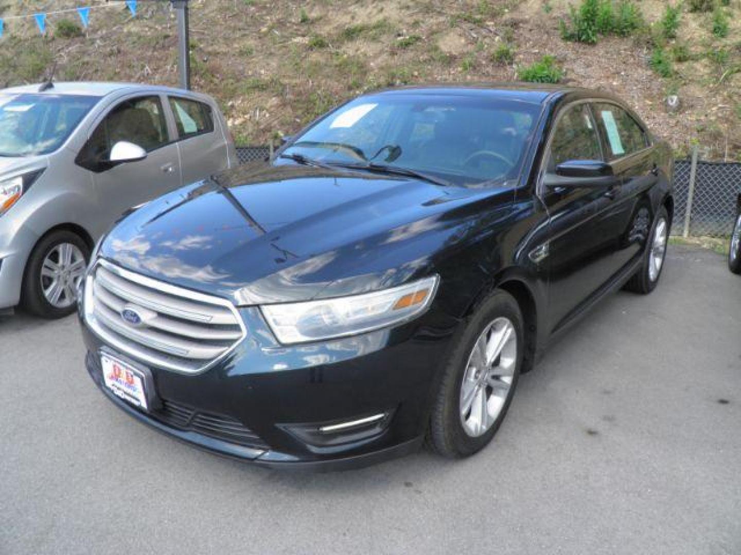 2014 BLACK Ford Taurus SEL FWD (1FAHP2E8XEG) with an 3.5L V6 engine, AT transmission, located at 15520 McMullen Hwy SW, Belair, MD, 21502, (301) 729-3700, 39.581375, -78.846451 - Photo#0