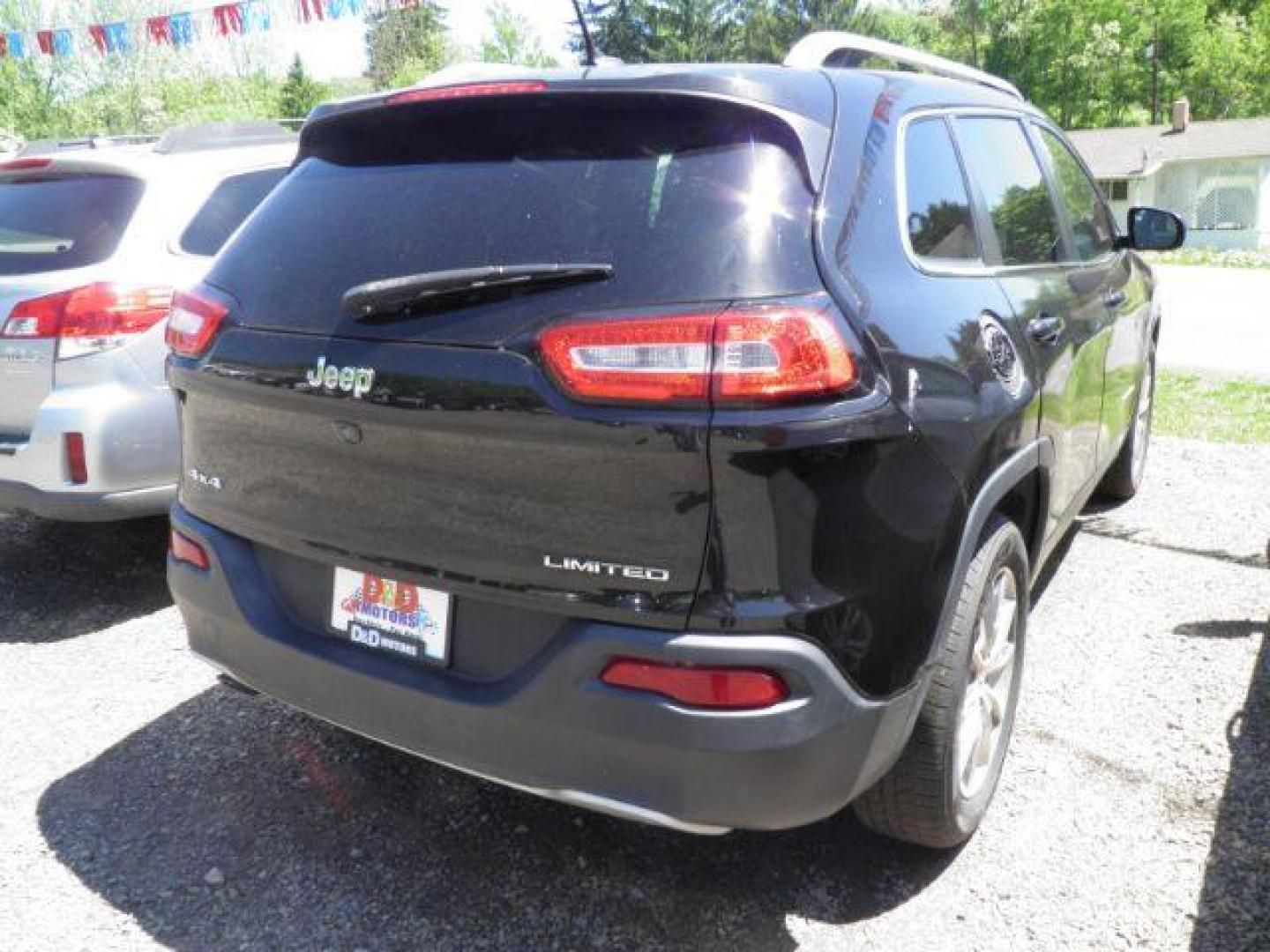 2014 BLACK Jeep Cherokee Limited 4WD (1C4PJMDB1EW) with an 2.4L L4 engine, AT transmission, located at 19521 New George's Creek Rd SW, Barton, MD, 21521, (301) 463-2404, 39.524323, -79.017906 - Photo#5