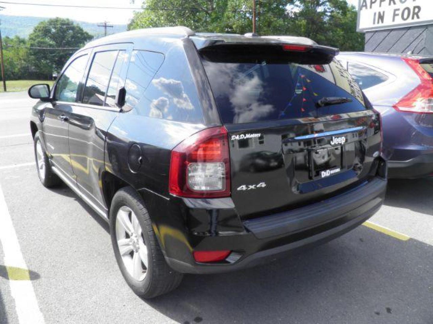 2014 BLACK Jeep Compass Latitude 4WD (1C4NJDEB5ED) with an 2.4L L4 engine, AT transmission, located at 15520 McMullen Hwy SW, Belair, MD, 21502, (301) 729-3700, 39.581375, -78.846451 - Photo#5