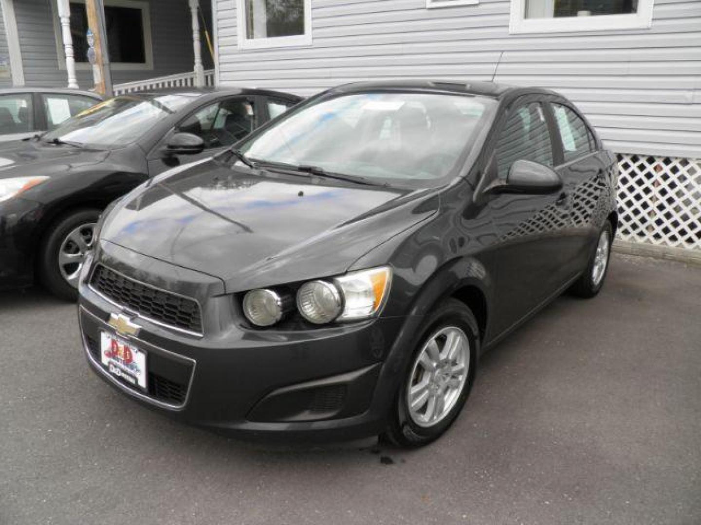 2015 GRAY Chevrolet Sonic LT Auto Sedan (1G1JC5SH1F4) with an 1.8L L4 engine, AT transmission, located at 15520 McMullen Hwy SW, Belair, MD, 21502, (301) 729-3700, 39.581375, -78.846451 - Photo#0