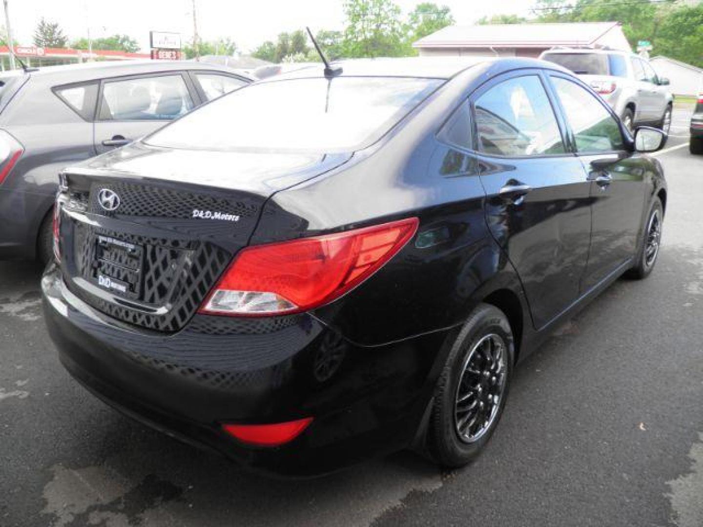 2015 Triathlon Gray Hyundai Accent GLS 4-Door 6A (KMHCT4AE3FU) with an 1.6L L4 DOHC 16V engine, 6-Speed Automatic transmission, located at 15520 McMullen Hwy SW, Belair, MD, 21502, (301) 729-3700, 39.581375, -78.846451 - Photo#4