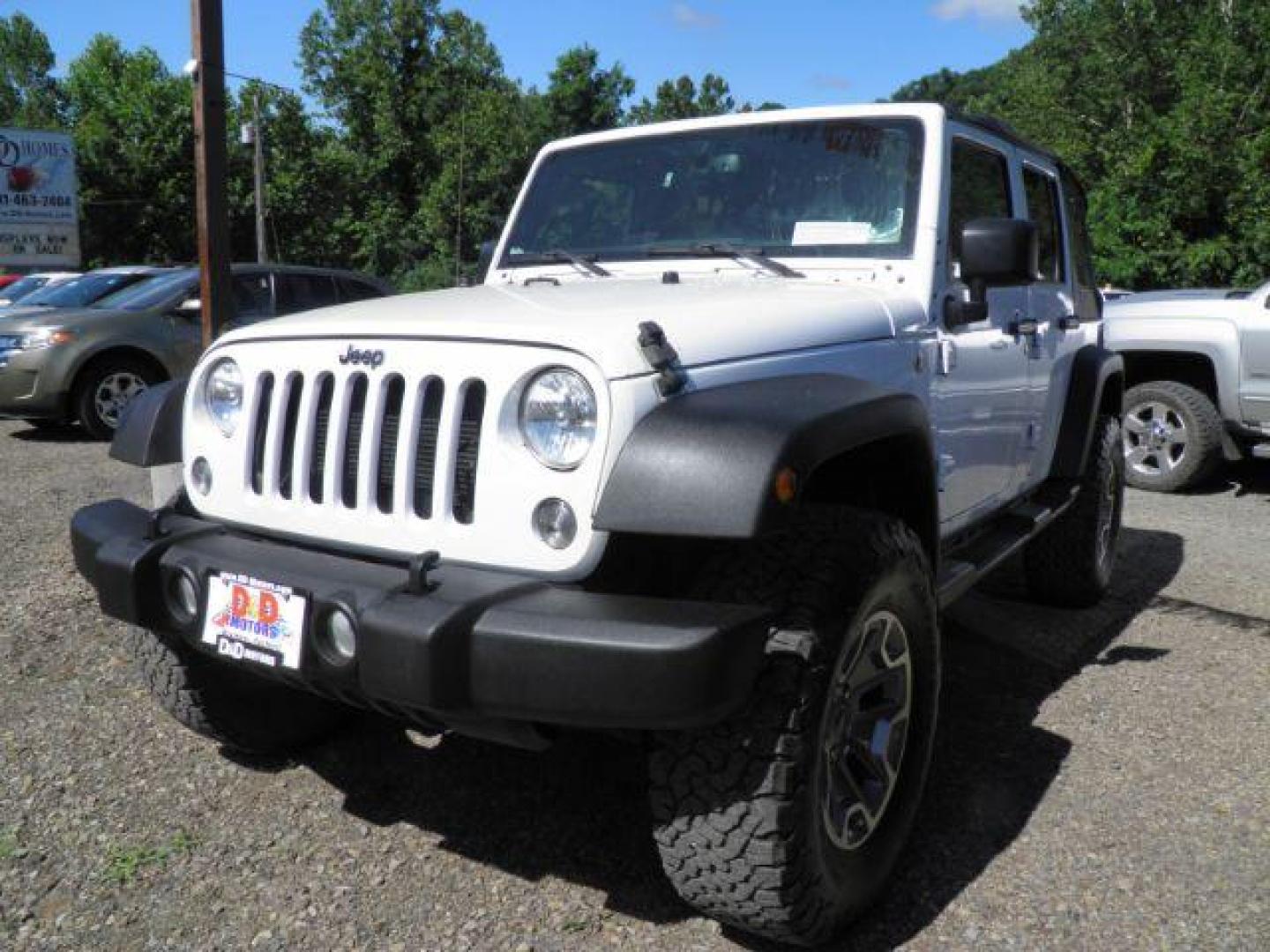 2015 WHITE Jeep Wrangler Unlimited Sport 4WD (1C4BJWDGXFL) with an 3.6l V6 engine, AT transmission, located at 19521 New George's Creek Rd SW, Barton, MD, 21521, (301) 463-2404, 39.524323, -79.017906 - Photo#0